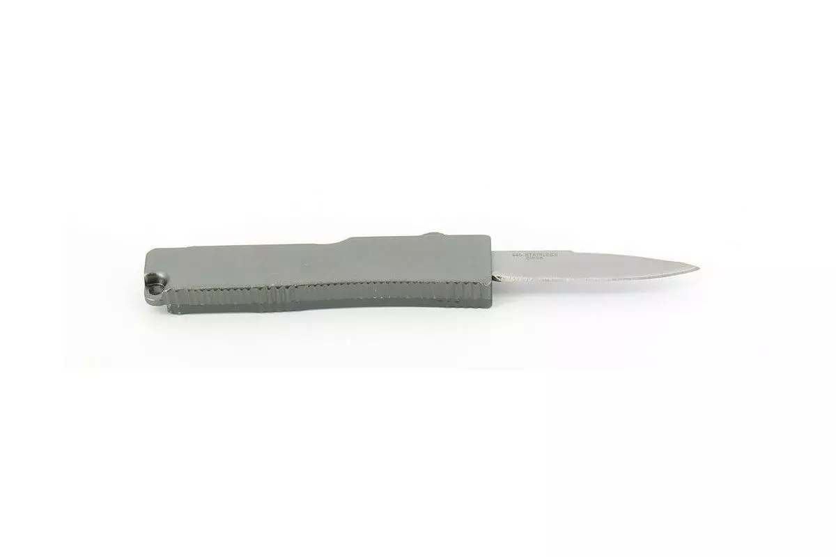 Mini Couteau Ejectable poussoir sur le dessus 